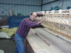 Clamping the underside of the leading edge ply.